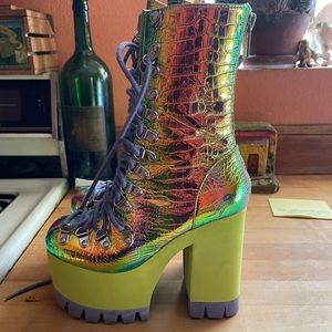 Iridescent purple platform boots.